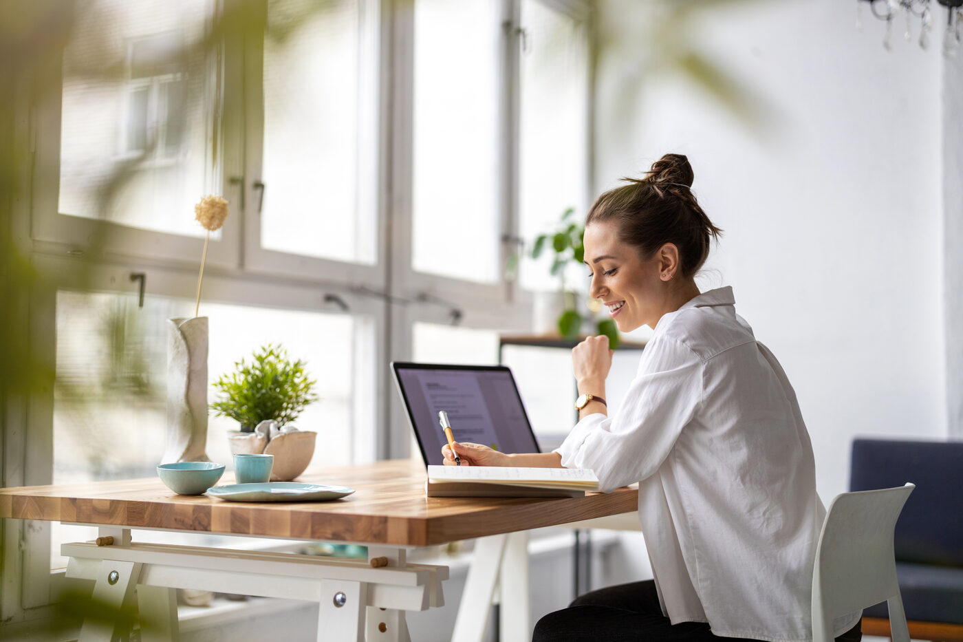 A professional working through her notes in a coaching session